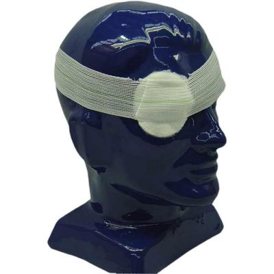 Eye Pad/Dressing with attached Bandage